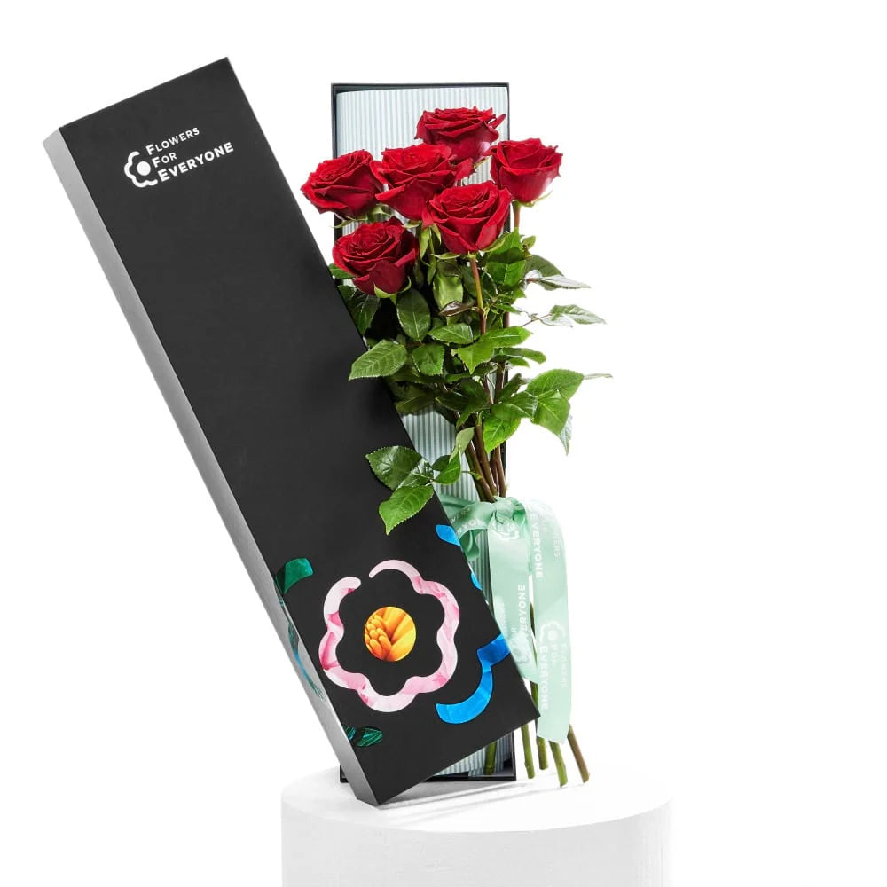 12 Red Rose Box with vibrant red roses in an elegant black gift box for romance flowers and same day delivery flowers