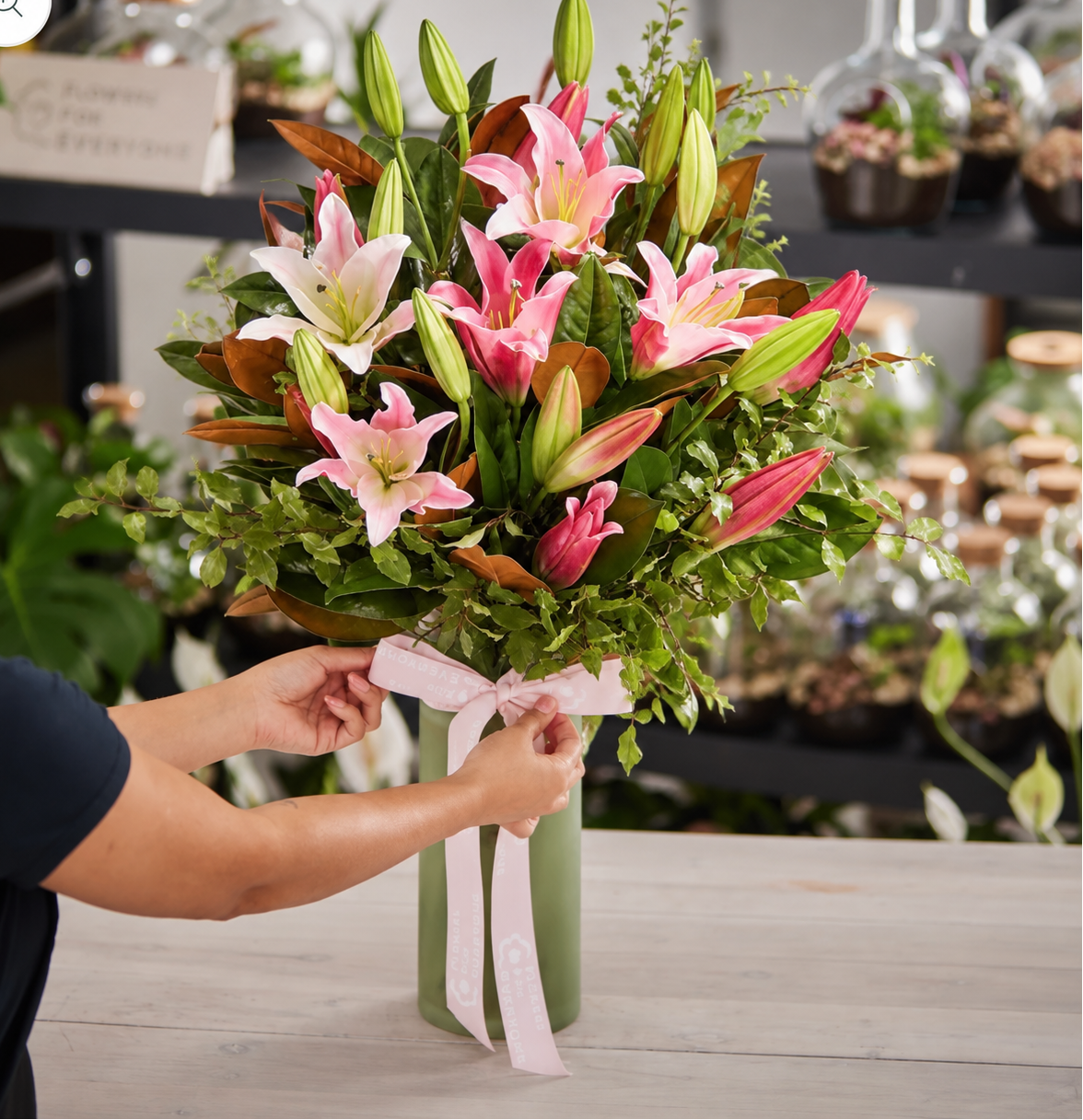 Pink Lily Queen Vase with fresh pink and white lilies lush greenery and a soft ribbon for birthday flowers anniversary flowers or same-day delivery flowers