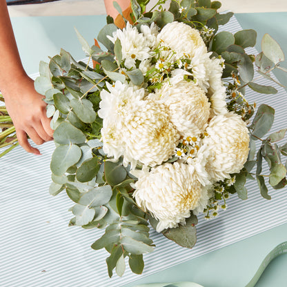 Soft Ivory Bouquet with lush eucalyptus greenery and elegant white chrysanthemums for sympathy flowers and special occasions