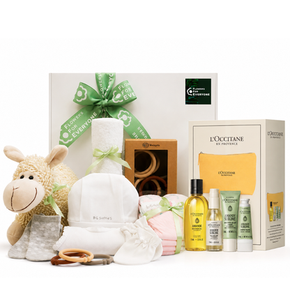 Mum & Baby Gift Hamper featuring a plush sheep toy baby clothes soft blanket teething ring and L'Occitane pamper products for a new baby gift