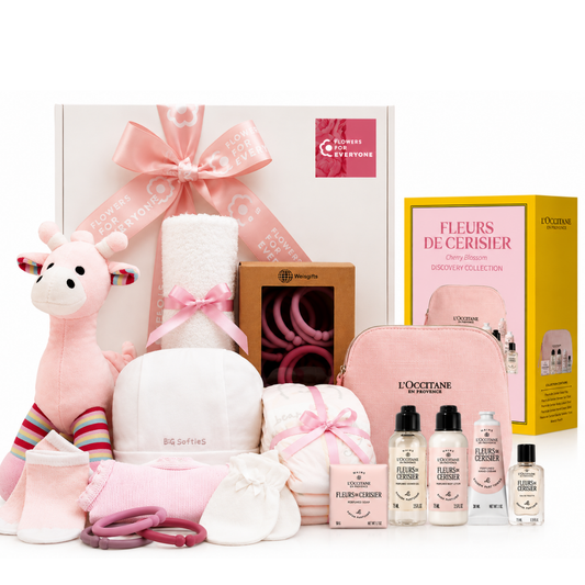 Mum & Baby Girl Gift Hamper with pink baby clothes plush giraffe baby essentials and L Occitane pampering gifts for new baby flowers delivery