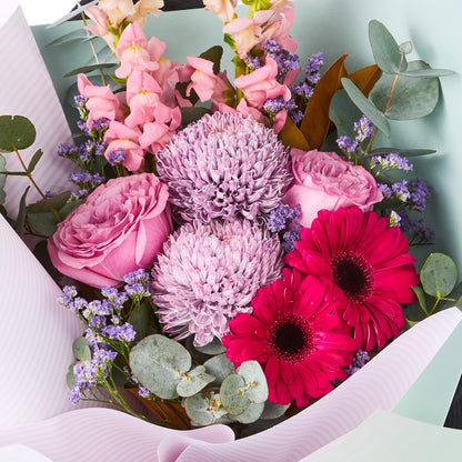 LAVANDER BLISS BOUQUET with pink roses chrysanthemums red gerberas purple filler and eucalyptus for birthday flowers graduation flowers and same-day delivery flowers