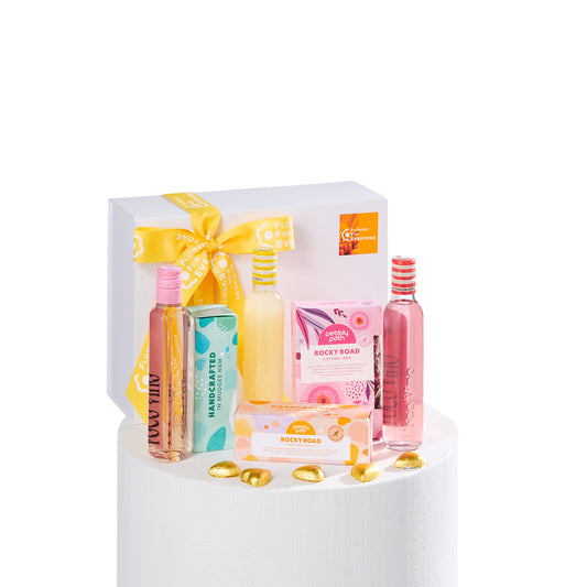 Party Time Hamper with colourful drink bottles hand care products rocky road treats and chocolates for birthday gifting with same day delivery flowers