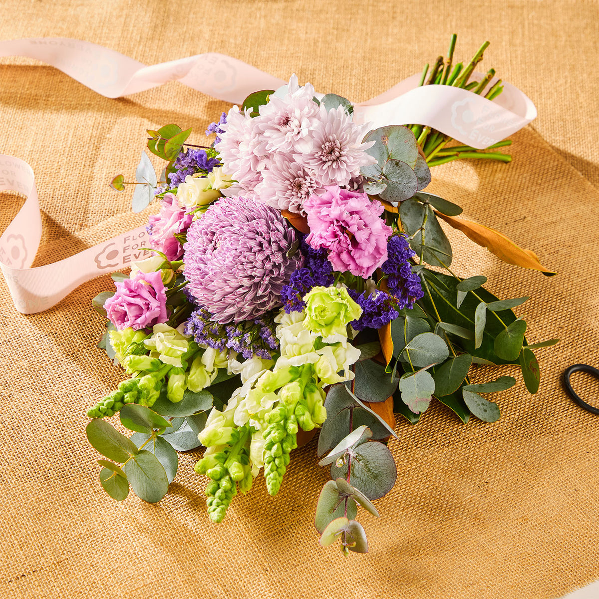 SWEET PURPLE POSY bouquet with pink chrysanthemums purple blooms green snapdragons and eucalyptus for birthday flowers and same day delivery flowers