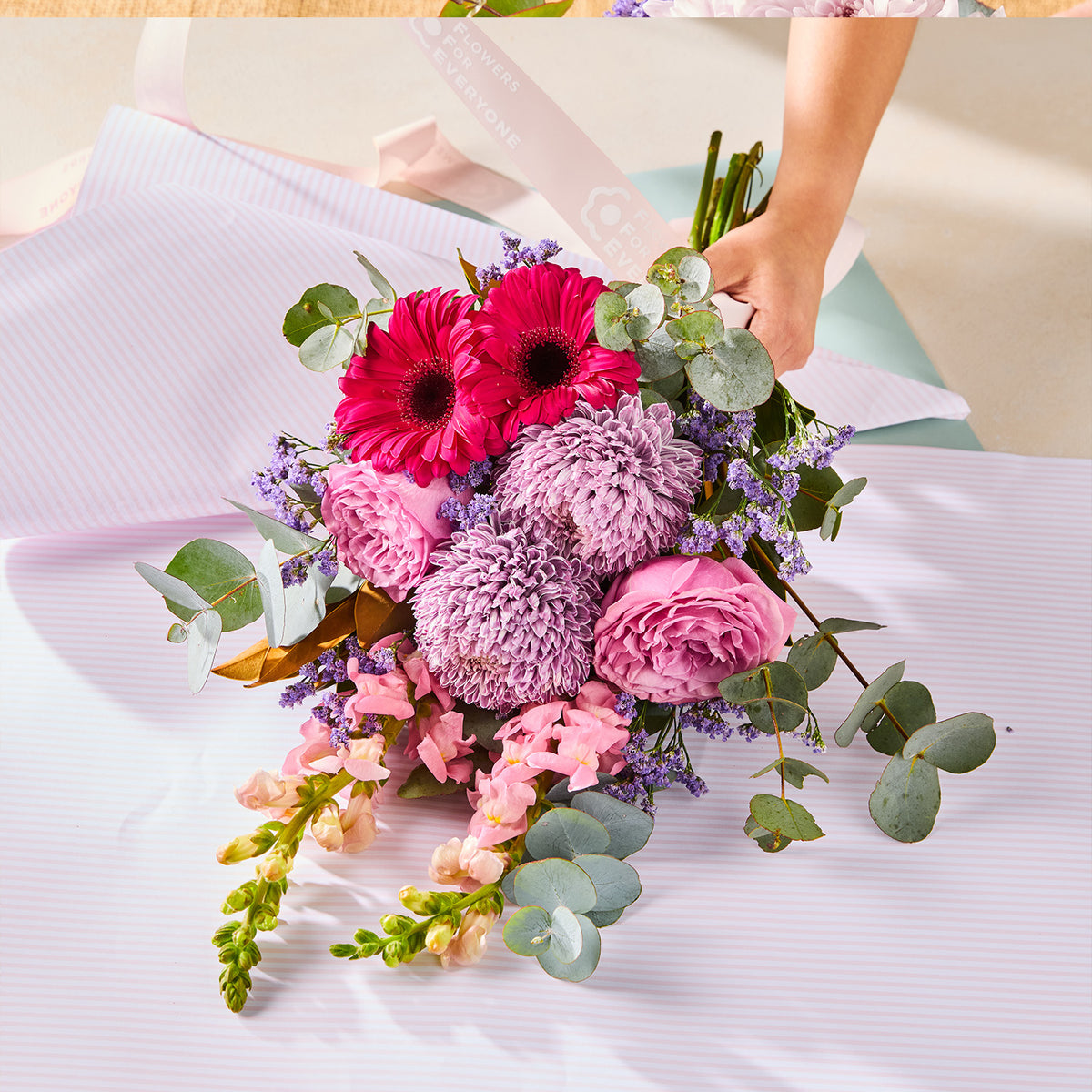 LAVANDER BLISS BOUQUET with pink gerberas chrysanthemums roses purple filler and eucalyptus for birthday flowers graduation flowers and same-day delivery flowers