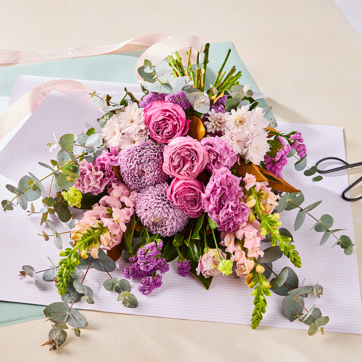 PURPLE PARADISE BOUQUET with pink roses purple chrysanthemums and eucalyptus for birthday flowers graduation flowers and same day delivery flowers