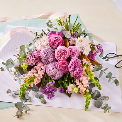 PURPLE PARADISE BOUQUET with pink roses purple chrysanthemums and eucalyptus for birthday flowers graduation flowers and same day delivery flowers