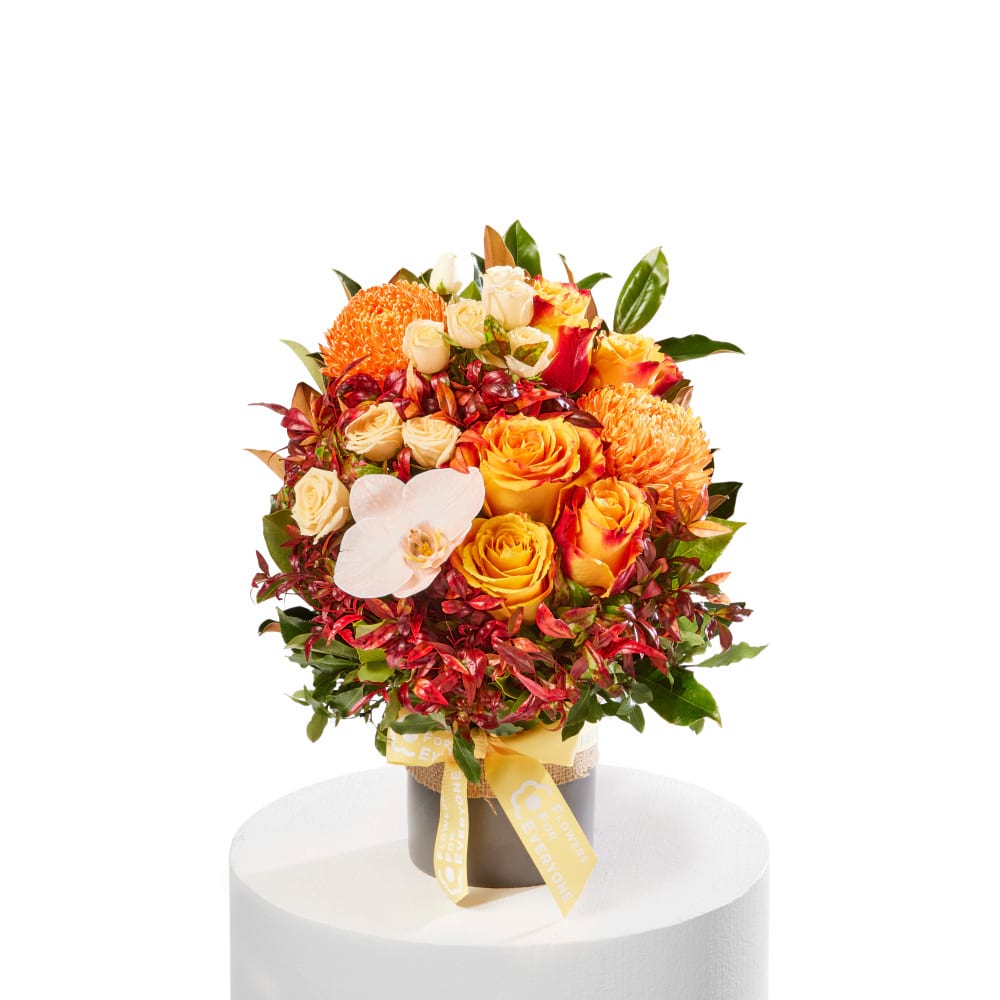 Autumn Flower Pot with orange roses chrysanthemums and lush greenery arranged in a decorative pot for autumn flowers and same day delivery flowers