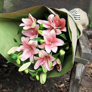 gift wrapped lily bouquet flowers delivered